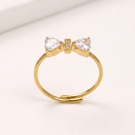 Adora Bow Ring - Ατσάλινο Δαχτυλίδι με Φιόγκο και Καρδιόσχημες Πέτρες